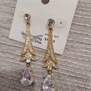 Designed in New York crystal ENTTRA Post at back I